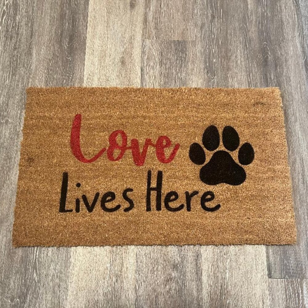 Love Lives here with dog paw decorative coir doormat